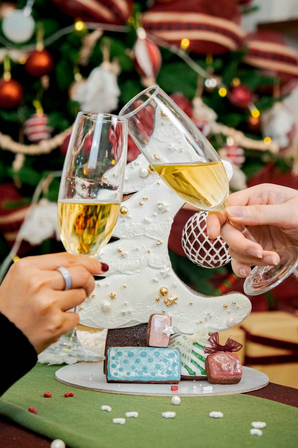 a couple of people that are holding wine glasses