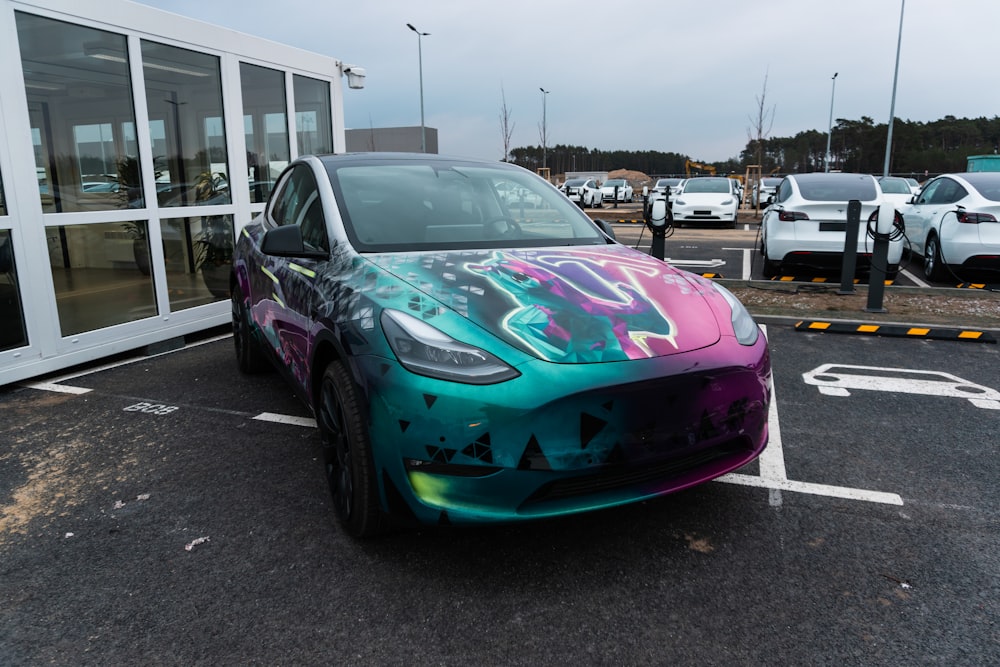 a colorful car parked in a parking lot