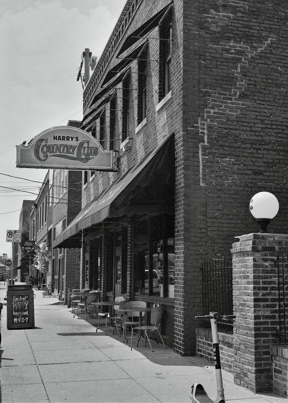 a black and white photo of a city street