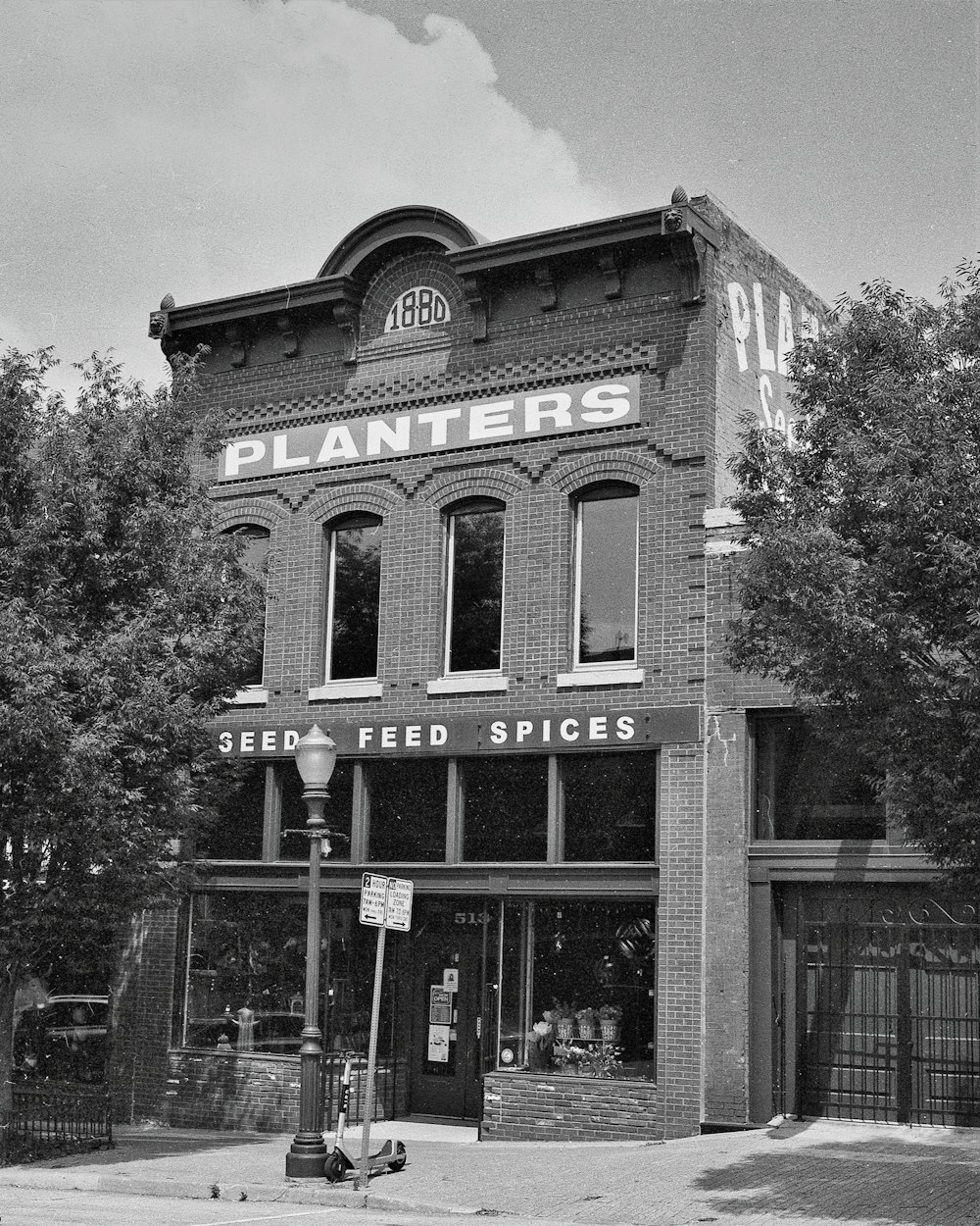 a black and white photo of a planter's store