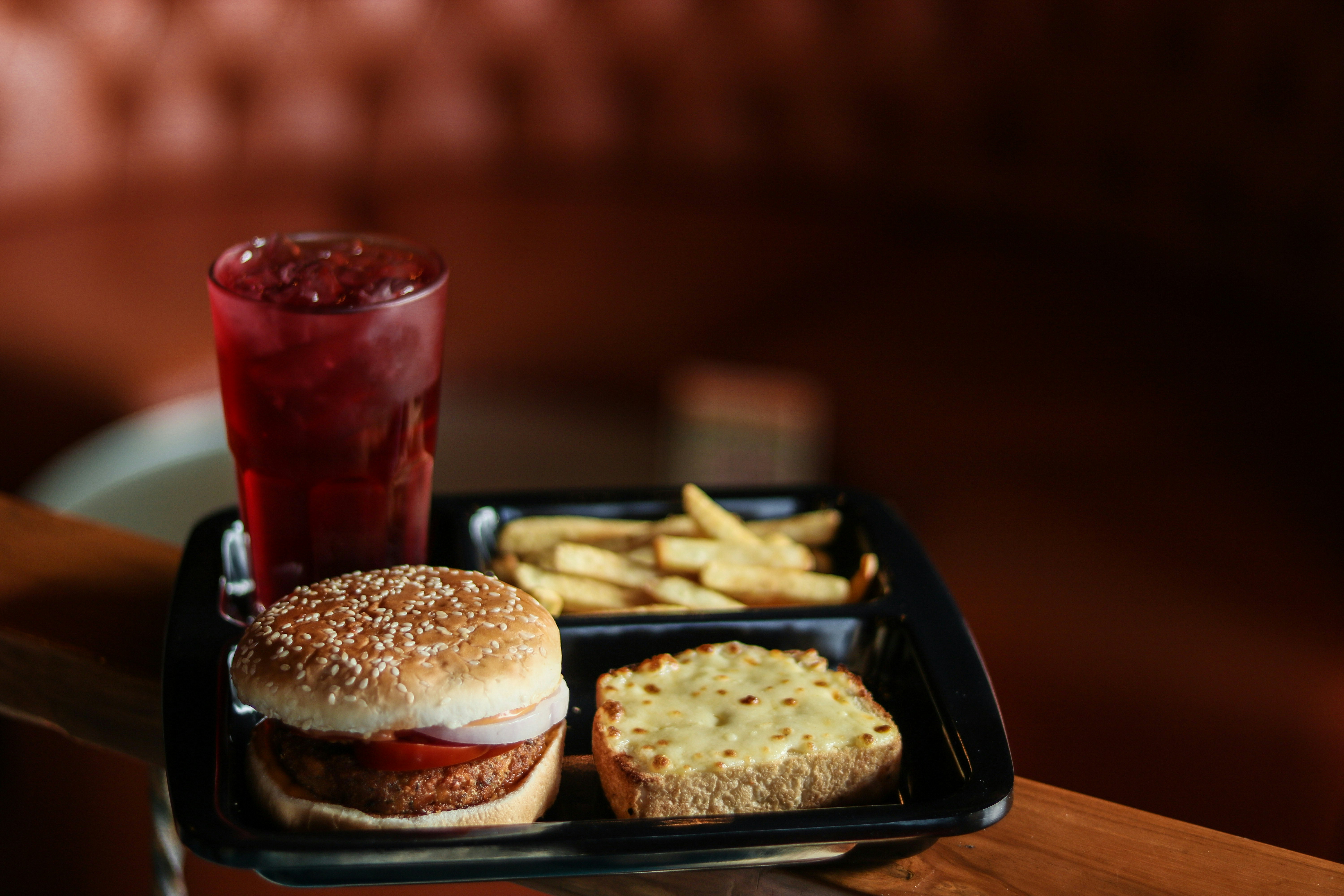 Tray with burger, fries and drink
