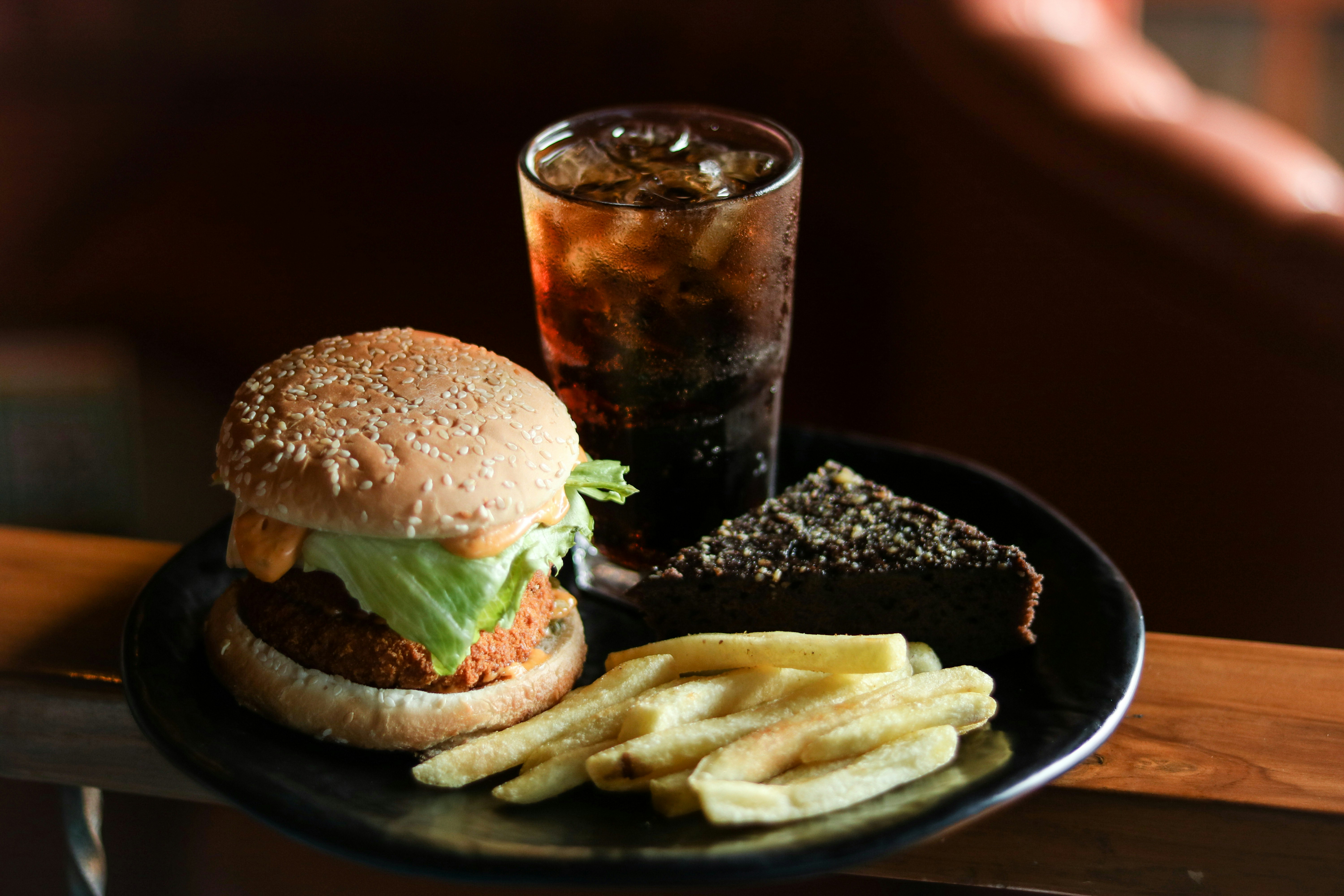 Burger, fries and a cold drink