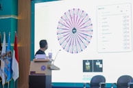 Close-up of a smartsociety360 expert explaining compliance checklists to a society committee.