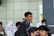 A group of students engaged in a live trading class, discussing strategies with enthusiasm.