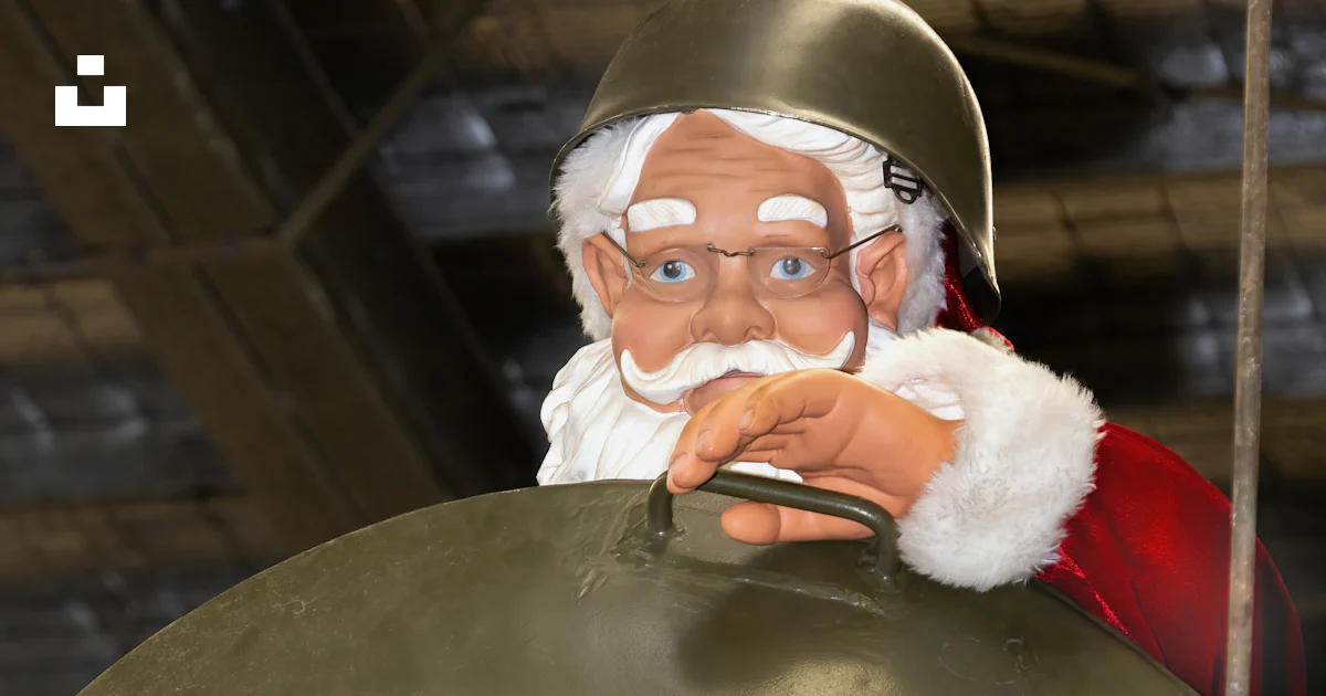 A statue of santa claus is on top of a tank photo โ Free Australia ...