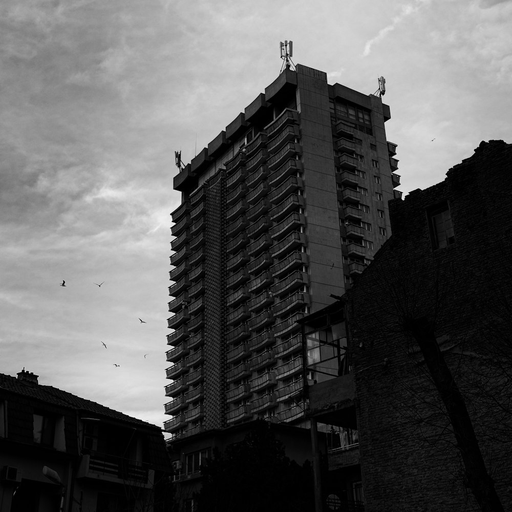 a black and white photo of a tall building