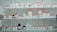 Shelves filled with a variety of containers and jars, primarily white with orange lids, indicating they are likely pharmaceutical or laboratory storage. The shelves are evenly spaced and well-organized, containing containers of different sizes.