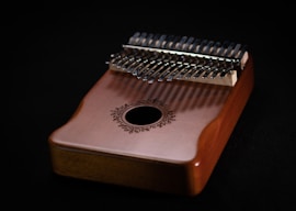 a close up of a musical instrument on a black background