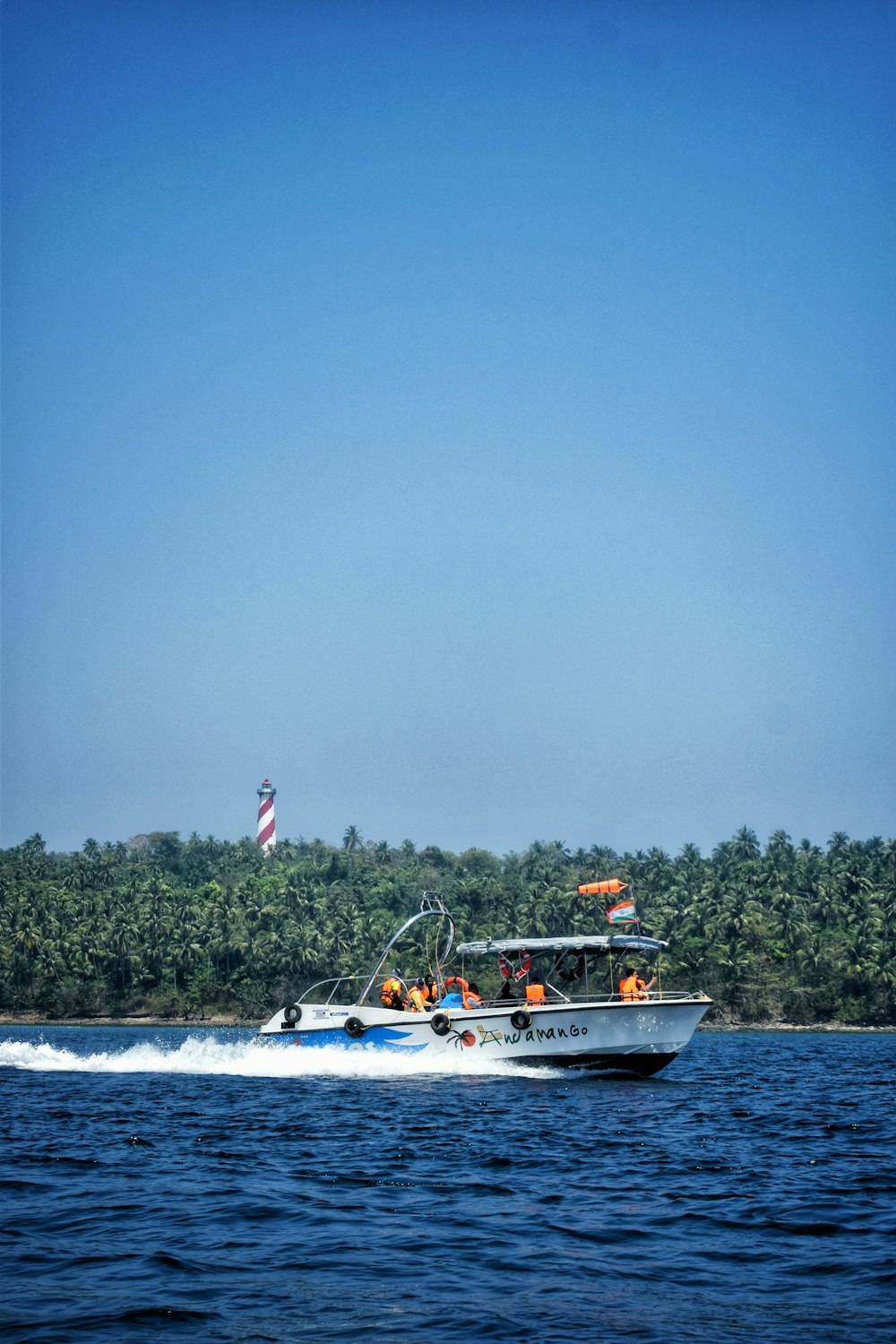 a boat with people on it is in the water