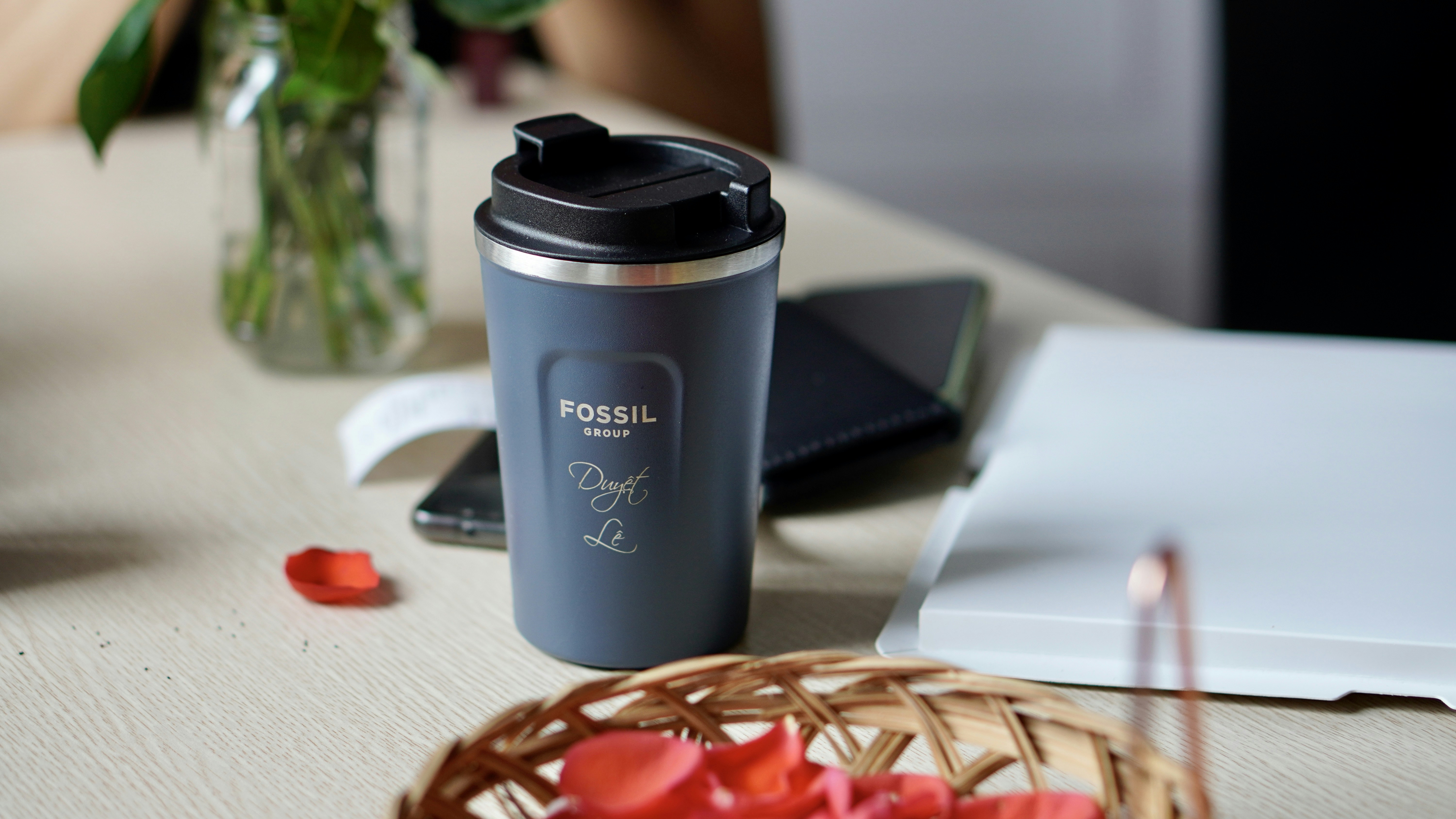 a coffee cup sitting on top of a table