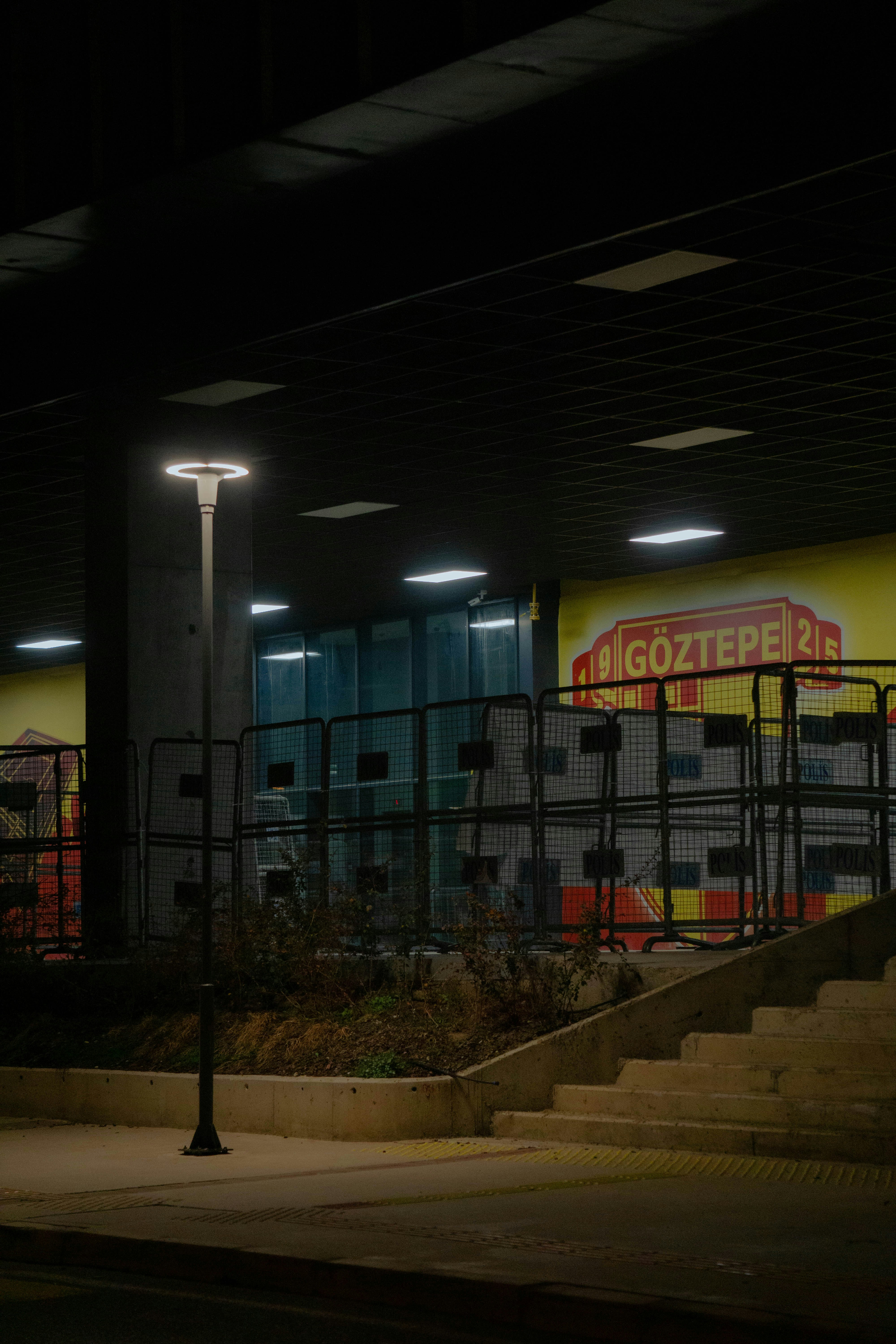 a building with a sign on the side of it at night