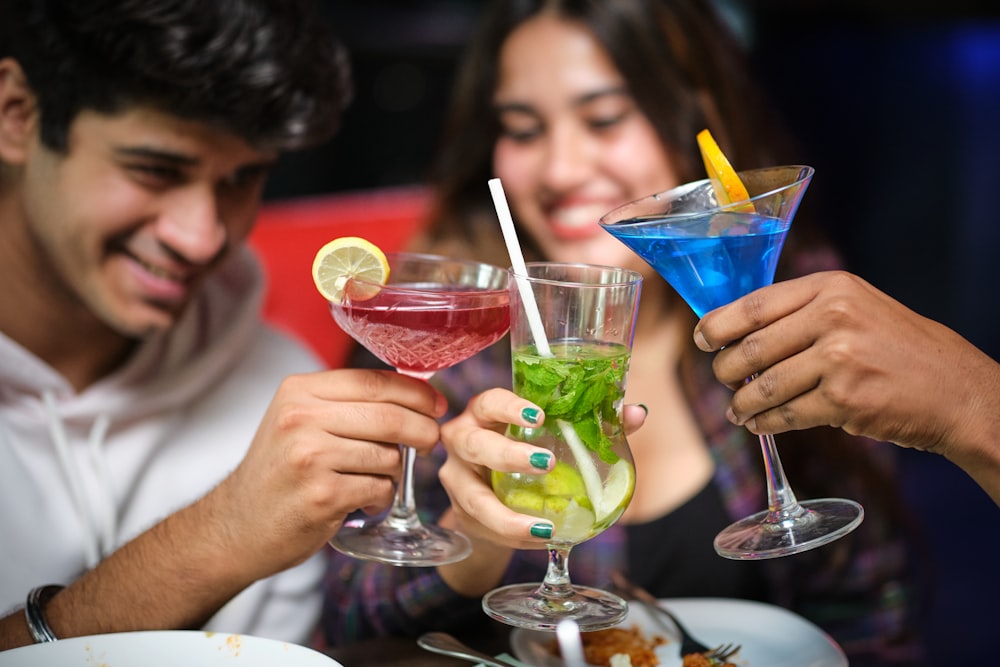 a group of people sitting at a table with drinks