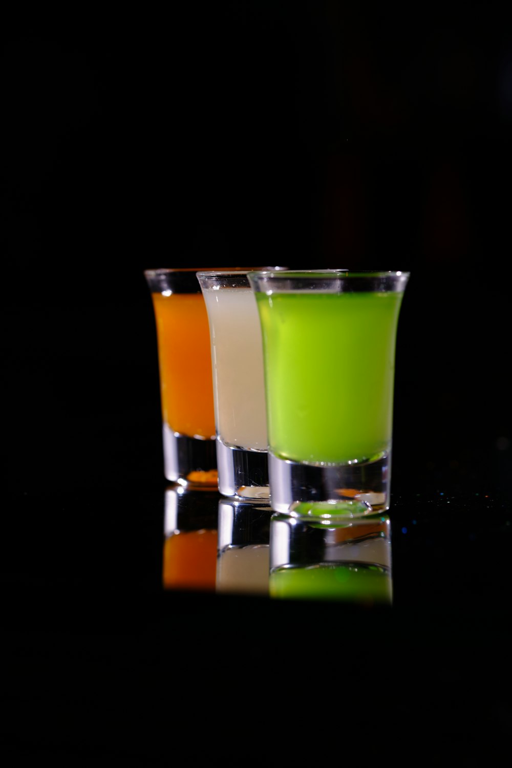 a couple of glasses that are sitting on a table