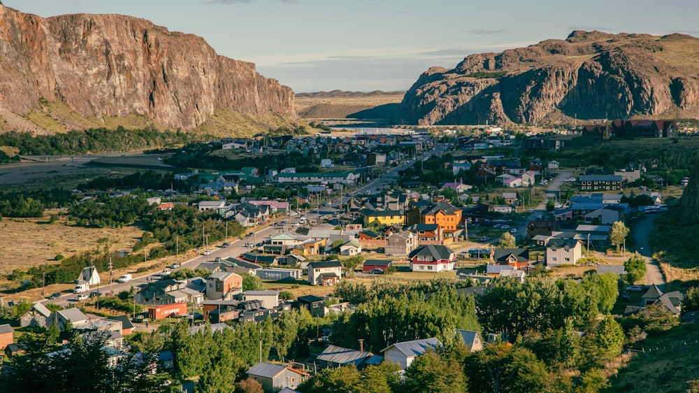 an aerial view of a small town in the mountains