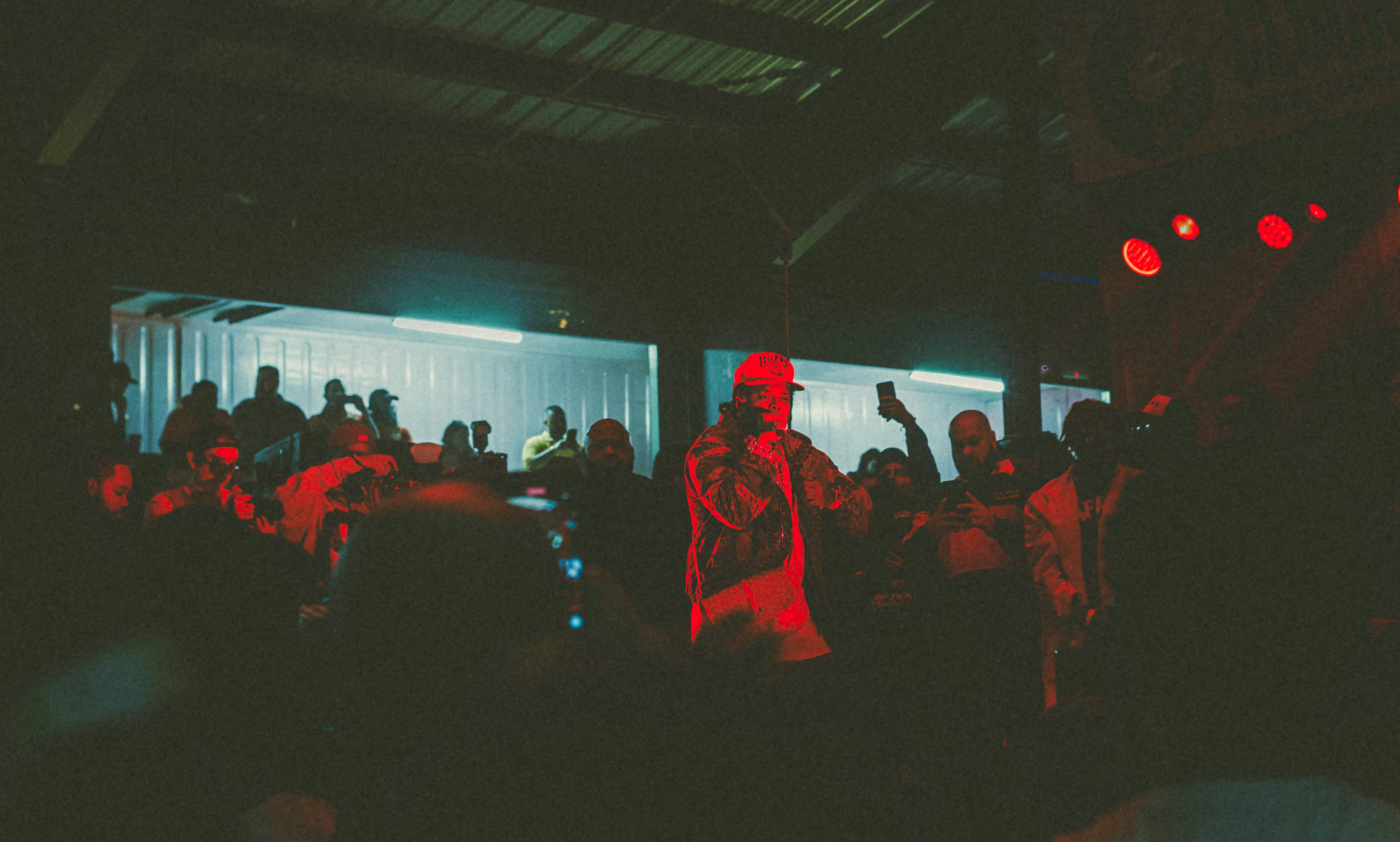 Artist performing live on stage at III Points Festival in Miami’s Wynwood District.