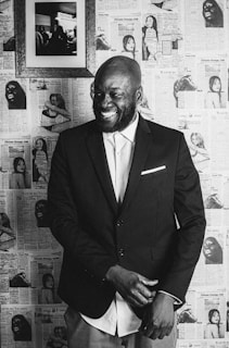 Photo of Roger Tong, founder of Double Archilles Debt Collection Service, in his office surrounded by decades of collection records.