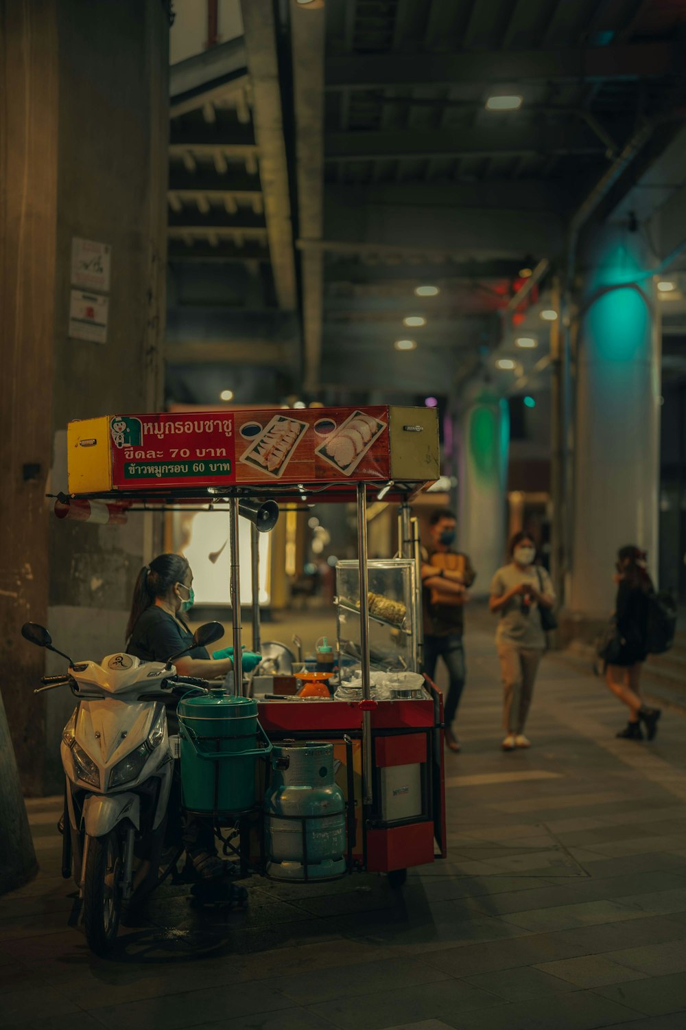 a food cart on the side of a street