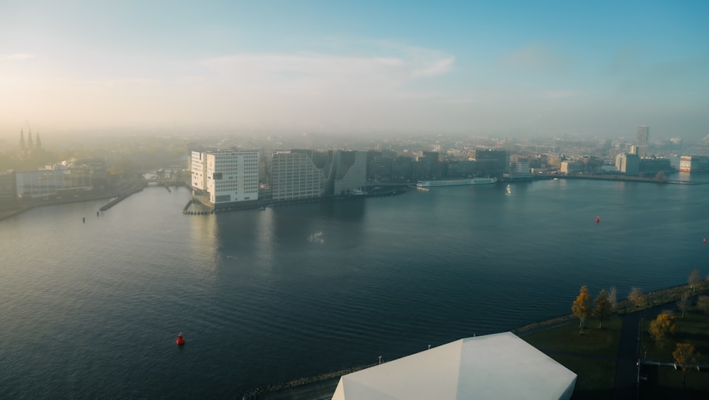 a large body of water surrounded by tall buildings