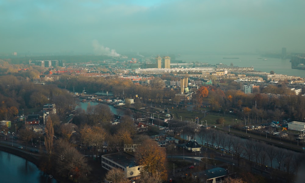 an aerial view of a city with a river running through it