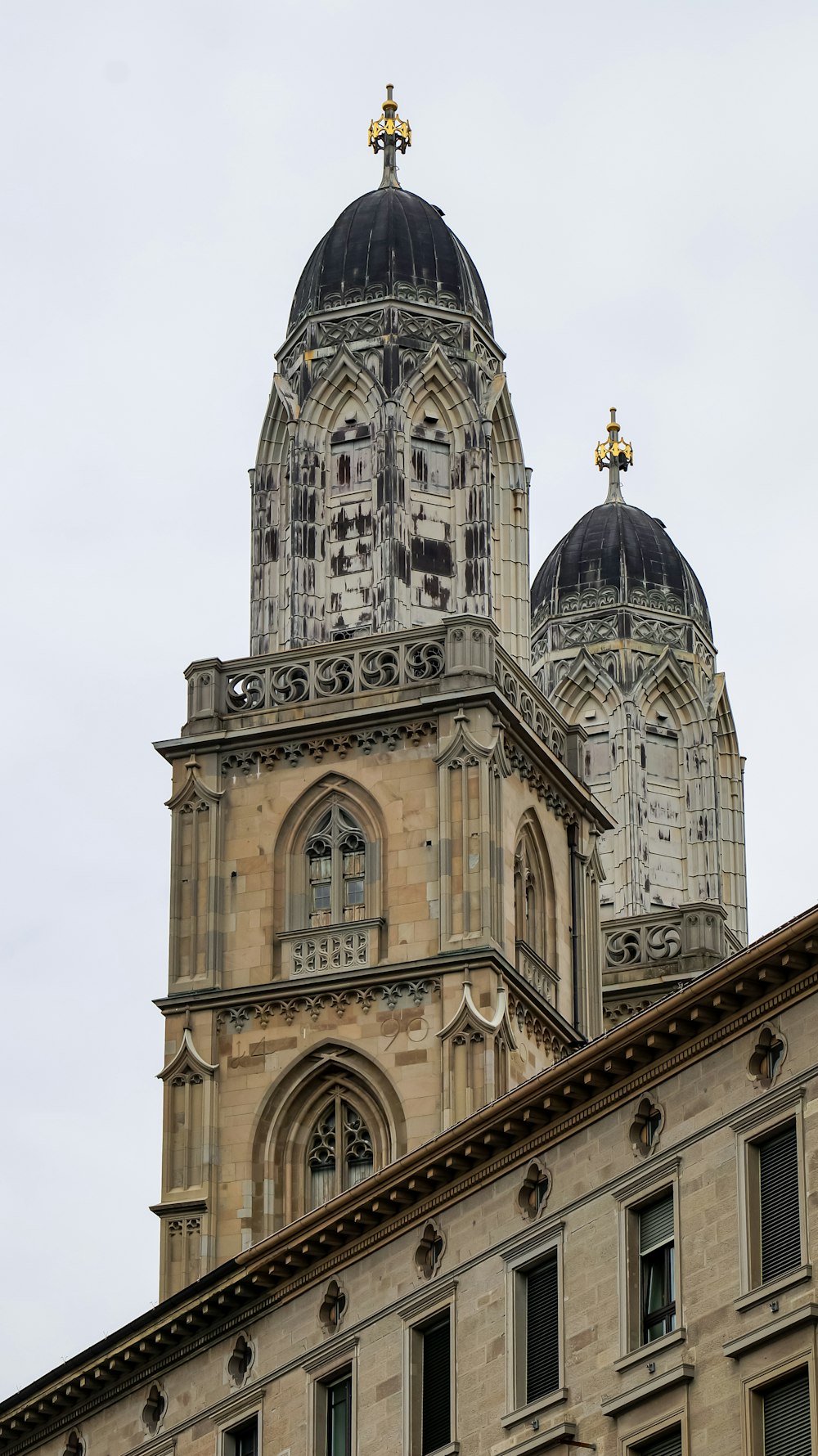 a very tall building with a clock on it's side