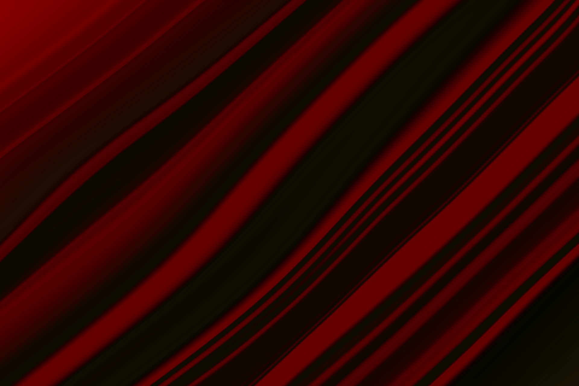 a close up of a red and black curtain