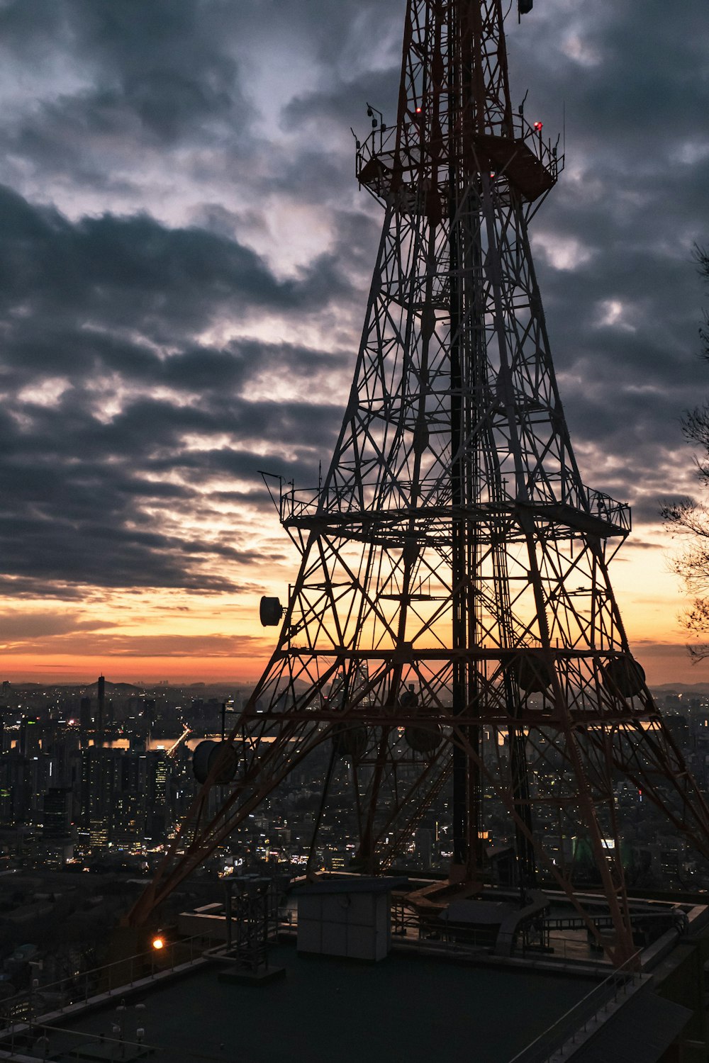 a very tall tower with a sky in the background