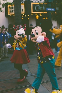 A lively theme park parade with dancers and characters in bright costumes delighting the crowd