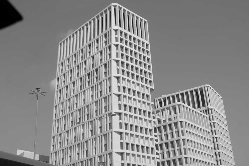 a black and white photo of a tall building