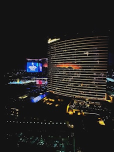 A diverse range of hotel buildings in various global cityscapes during daytime.