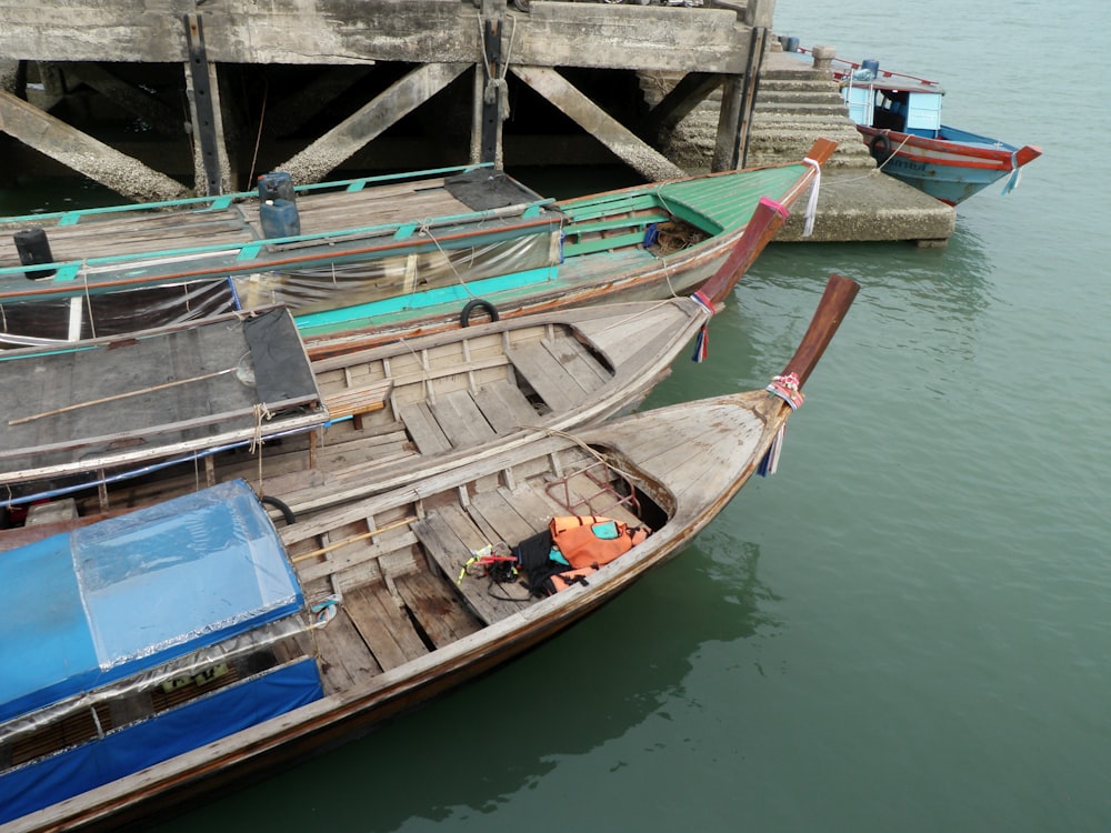 a couple of boats that are sitting in the water