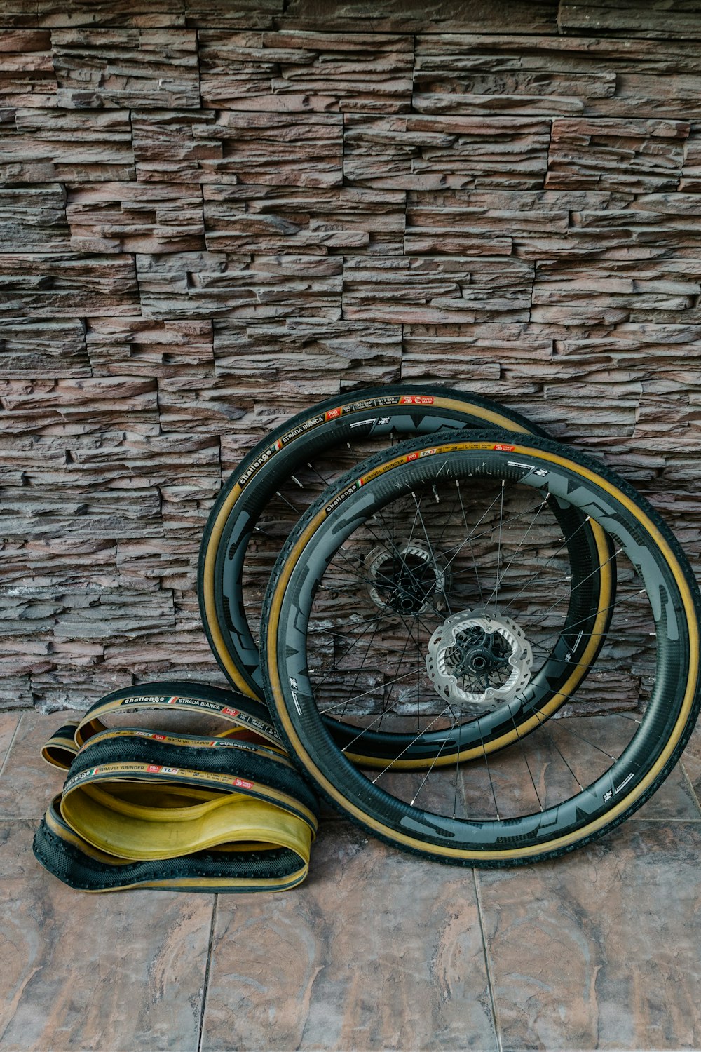 a couple of bikes tires sitting next to each other