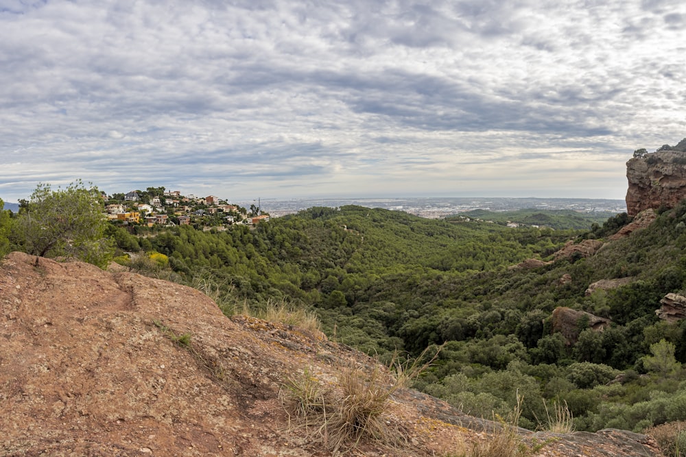 a view of a city from a hill top