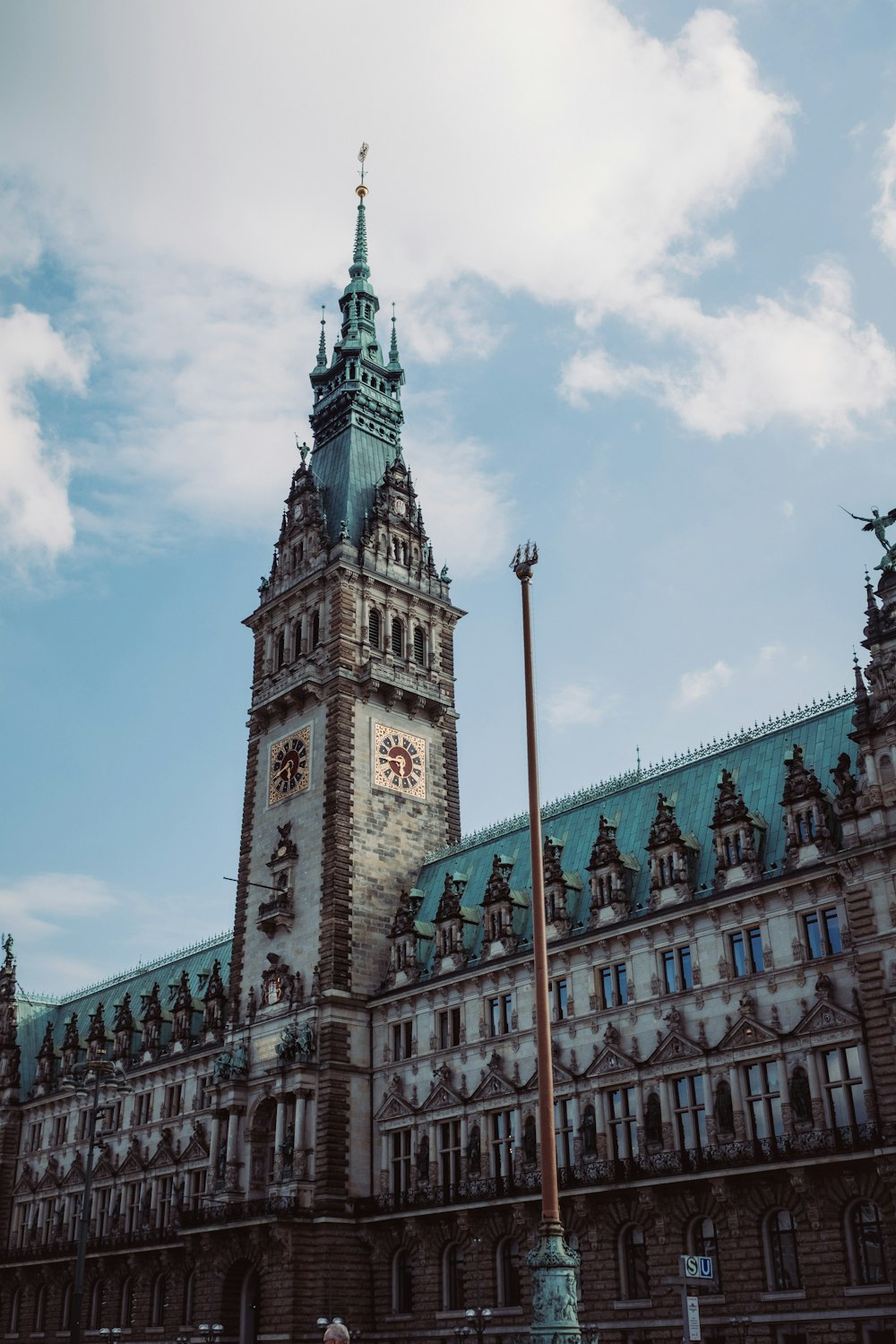 a large building with a clock on the front of it