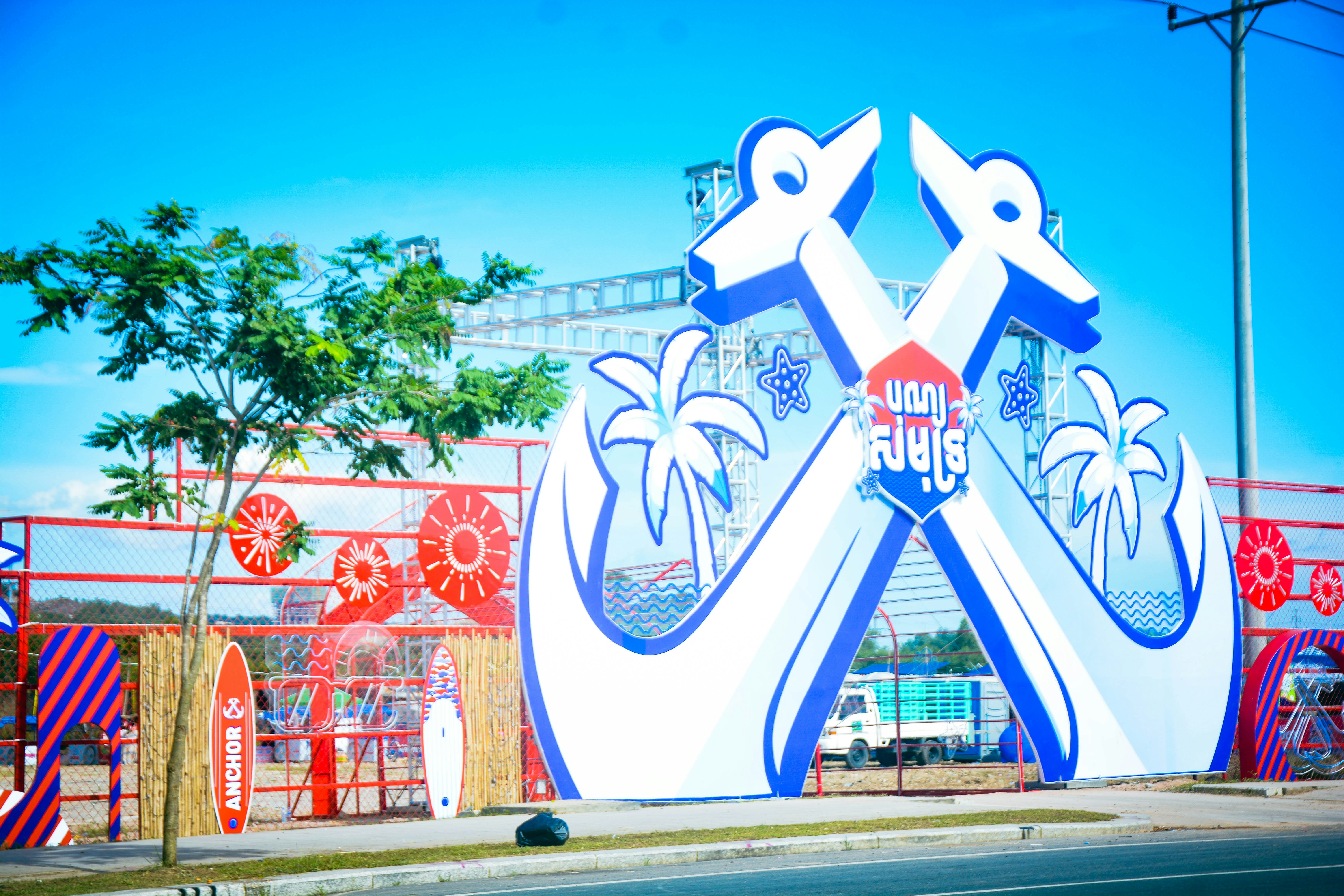 a large sign on the side of a road