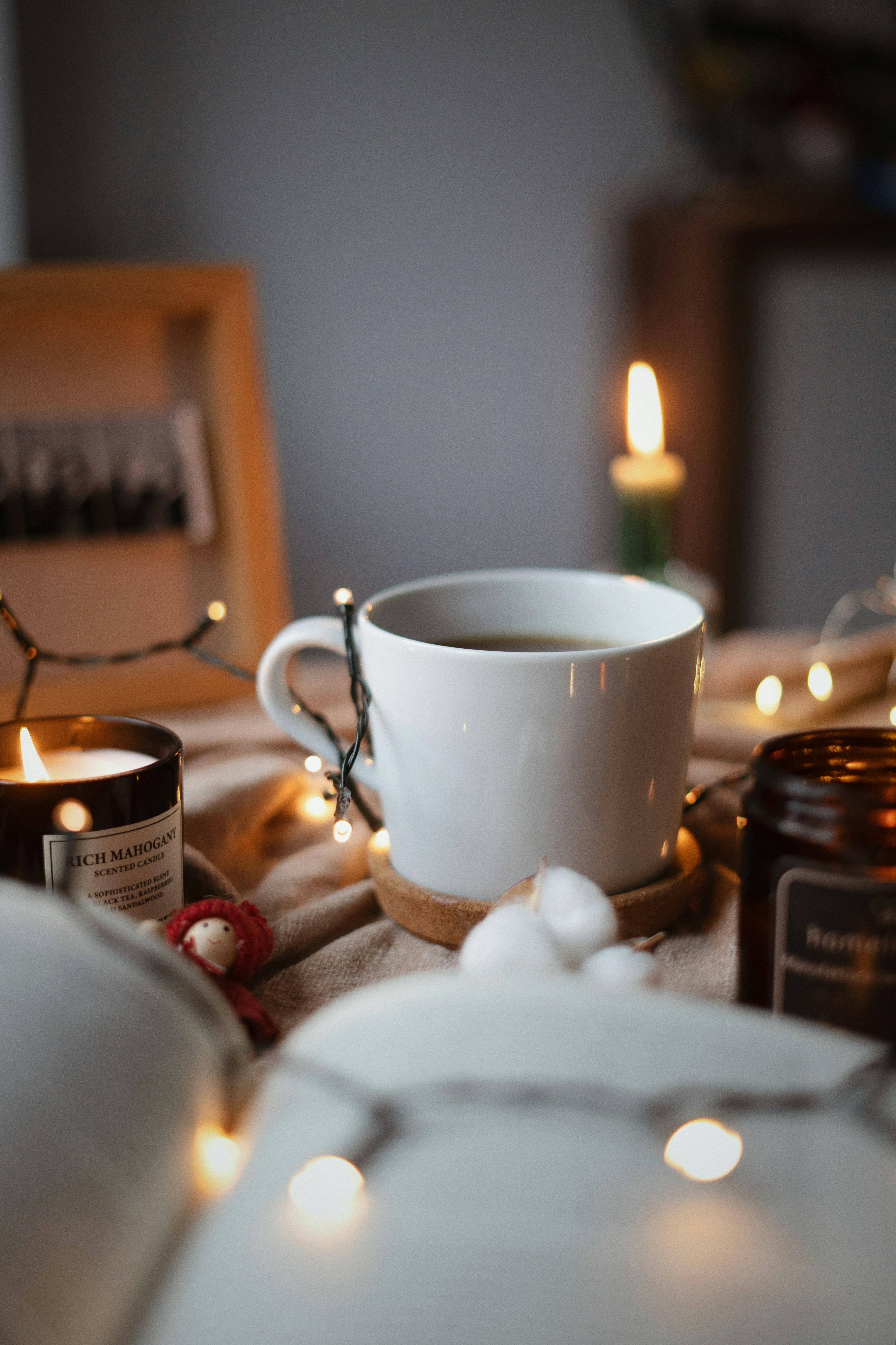 a cup of coffee sitting on top of a table