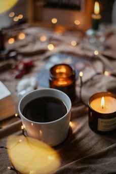 a cup of coffee sitting on top of a table