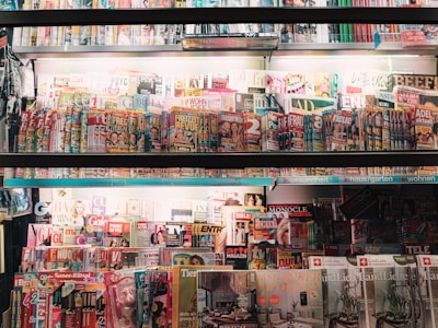 a large display of magazines in a store