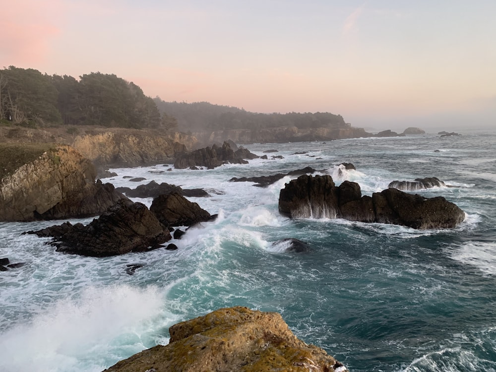 a view of the ocean from a cliff