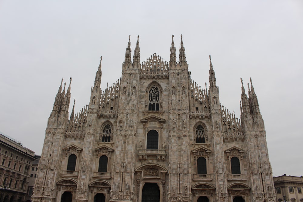 a large cathedral with a clock on the front of it