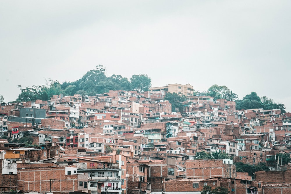 a large group of buildings on top of a hill