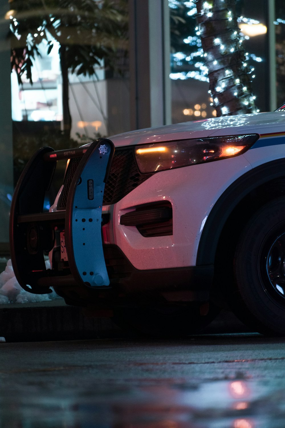 a police car parked on the side of the road