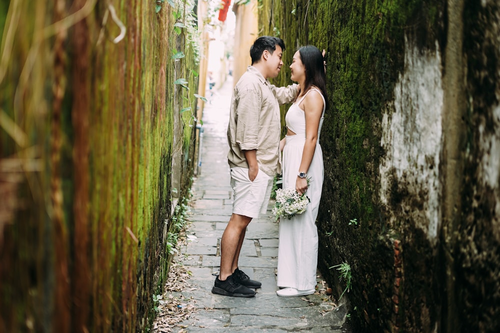 a man and a woman standing next to each other