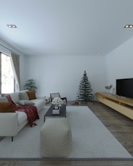 a living room filled with furniture and a flat screen tv