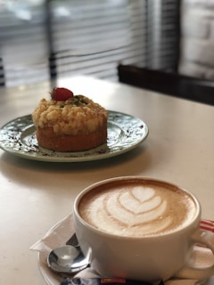 An inviting café scene with people enjoying desserts and coffee.
