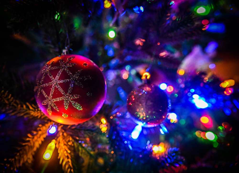 a close up of a christmas ornament on a tree