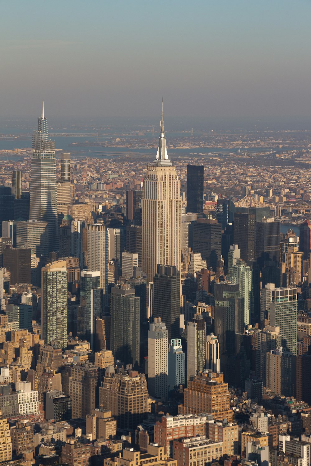 a view of a large city with tall buildings