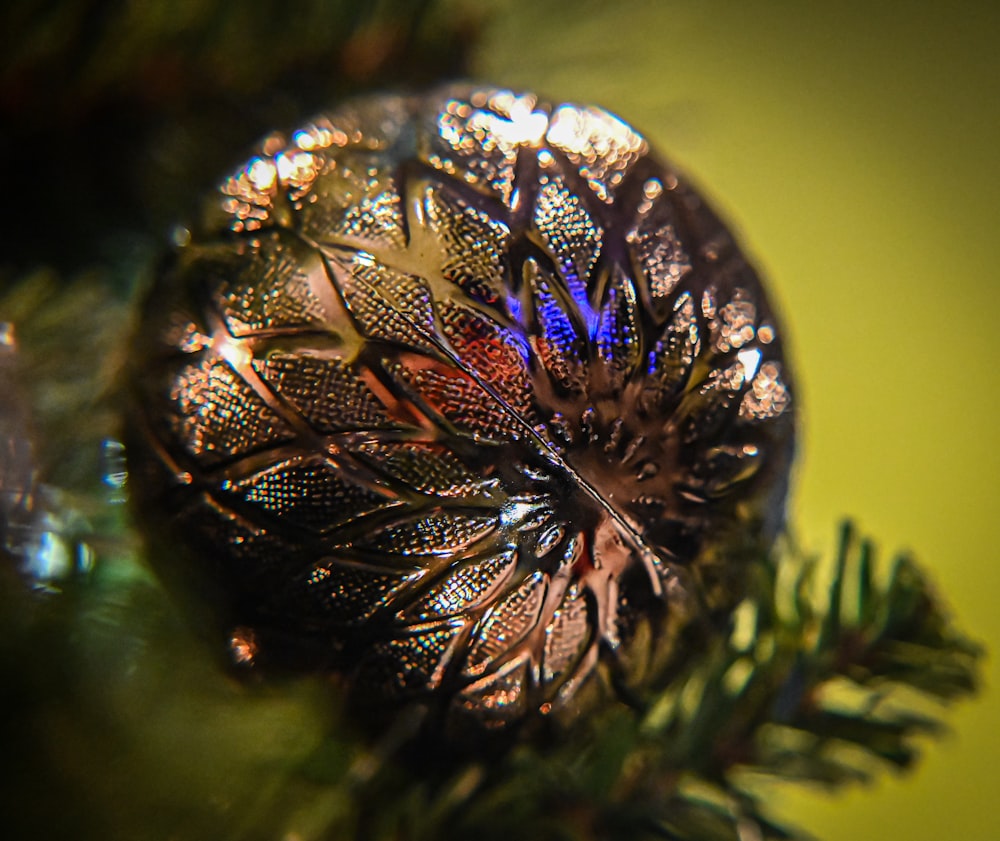 a close up of a christmas ornament on a tree