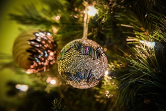 A close-up of a handcrafted abstract ornament on a decorative shelf.