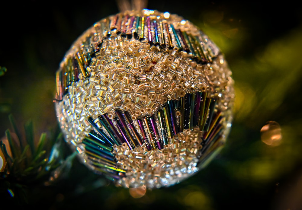 a close up of a christmas ornament on a tree