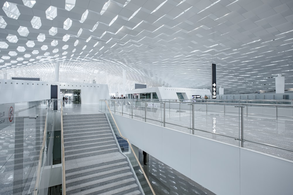 a large white building with a staircase leading up to it